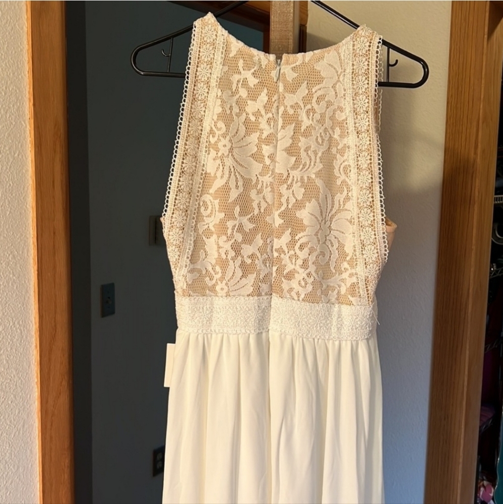 Two LuLu dresses one is Large and the other xlrg.